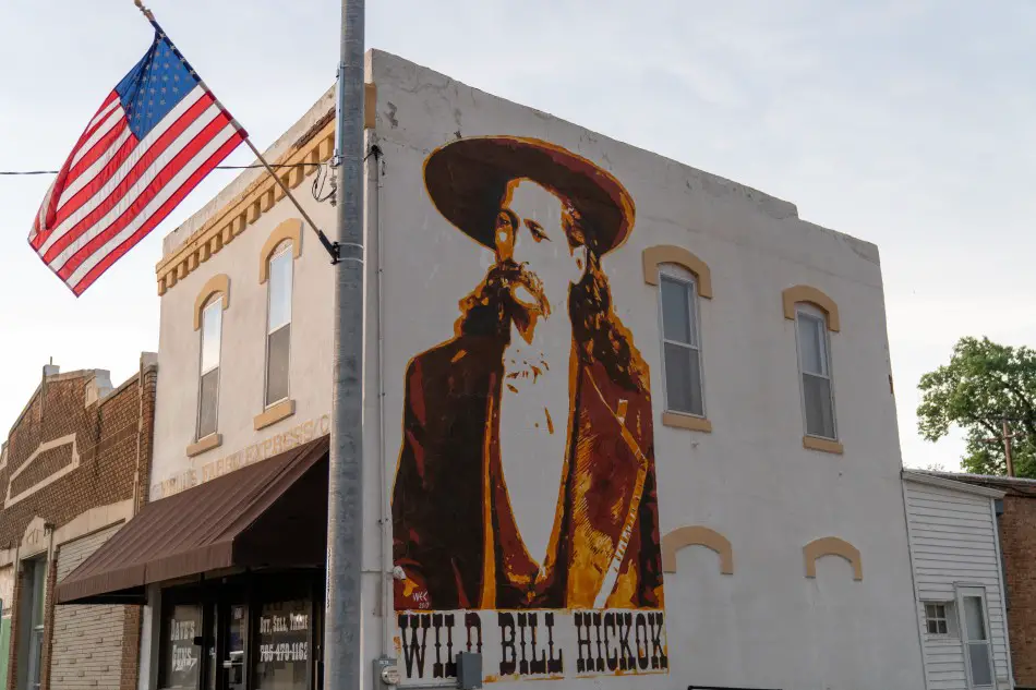 mural of wild bill hickok on the side of a building in Abilene Kansas