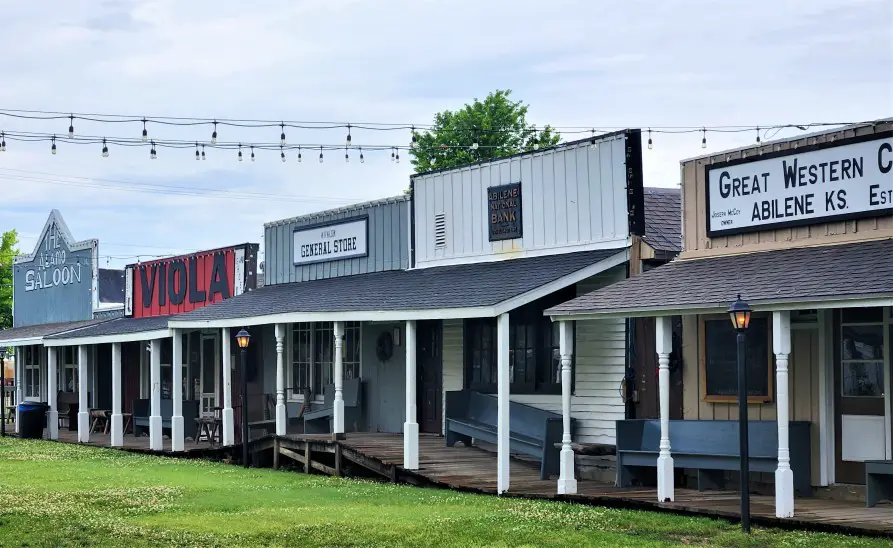 old buildings behind a boardwalk in old town abilene kansas