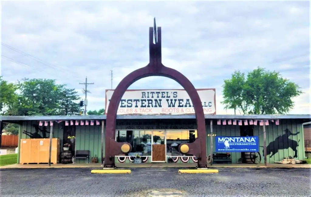 very big spur sitting as an archway into a western wear store in Abilene Kansas