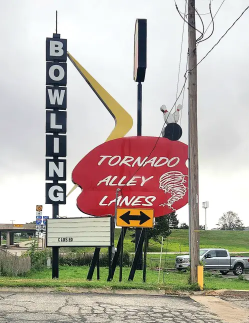 Bowling sign for Tornado Alley lanes with CLOSED lettering on it in Abilene Kansas