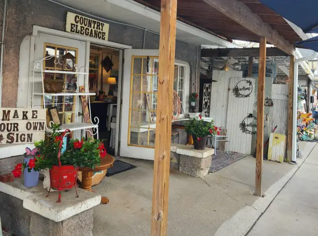 walkway with an open door of a shop in Shipshewana