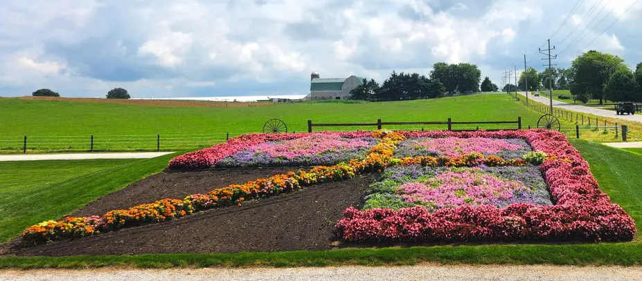 square plot of a garden with flowers laid out in the shape of a quilt in Shipshewana Indiana