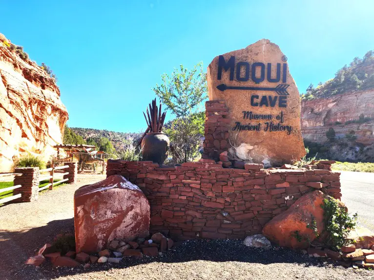 sandstone sign for Moqui Cave History Museum
