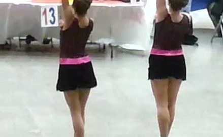 2 girls twirling batons