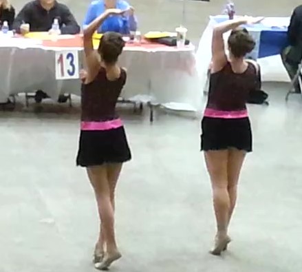 2 girls twirling batons