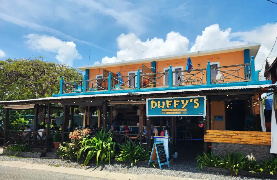 restaurant front with patio and sign that says Duffy's in Vieques