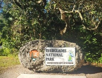 sign on a rock that says Everglades National Park