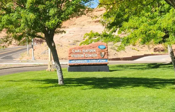 sign for Carl Hayden Visitor Center at Glen Canyon Dam during a southern Utah road trip along the Utah Arizona border