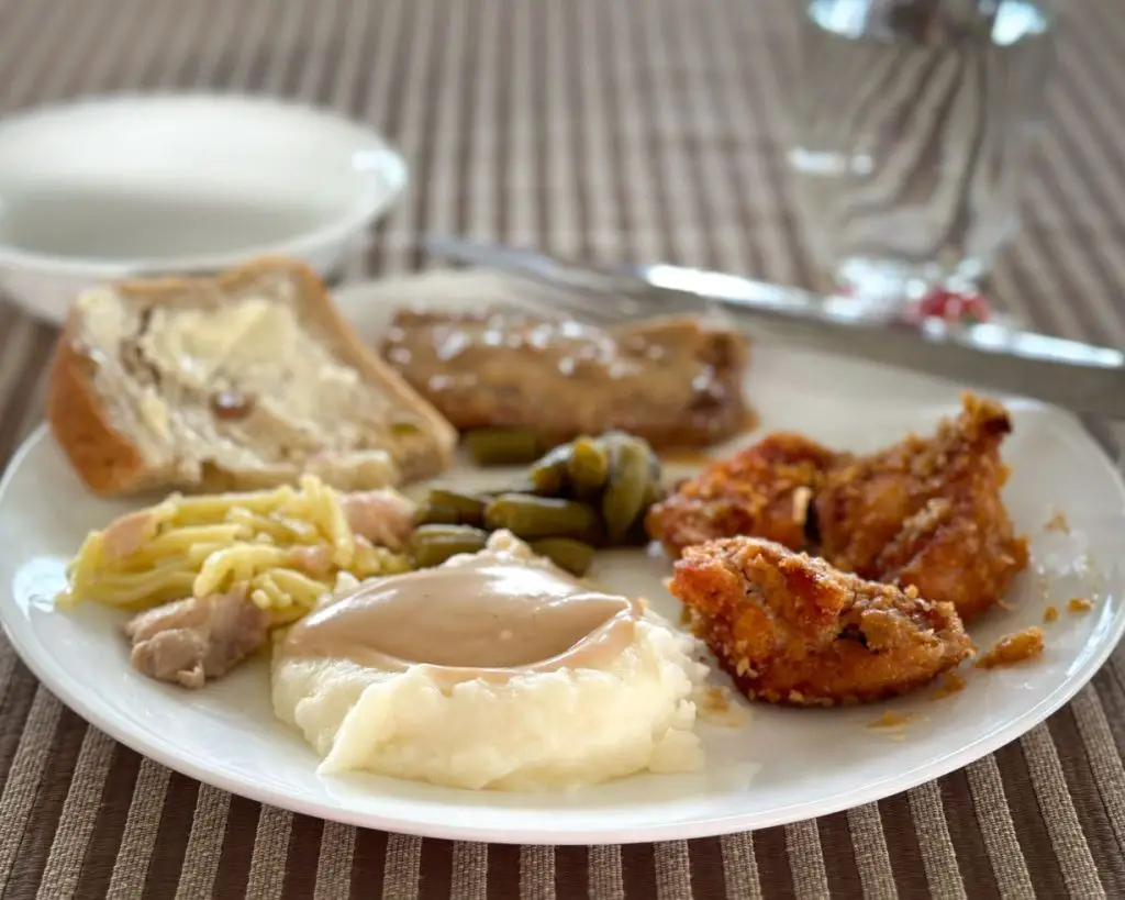 plate ona table full of a homecooked Amish meal