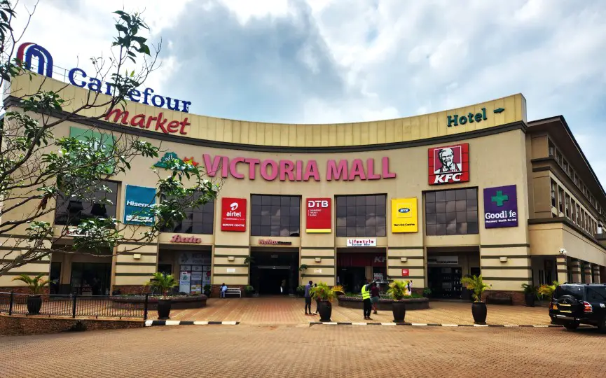 large building with sign Victoria Mall in Uganda