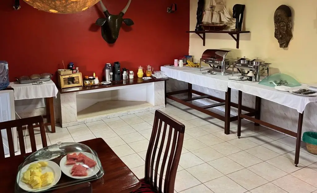 tables with serving dishes for the breakfast buffet at the hotel in entebbe uganda