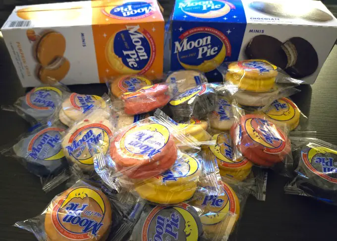 large pile of a variety of moon pie snacks on a table