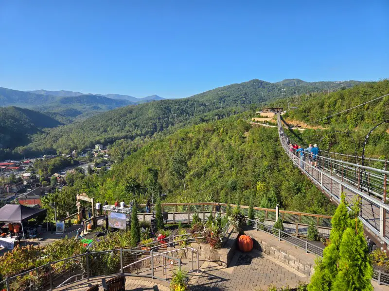 walkways and suspension bridge nestled in the mountains