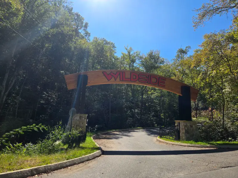 Large sign across the road that says WILDSIDE