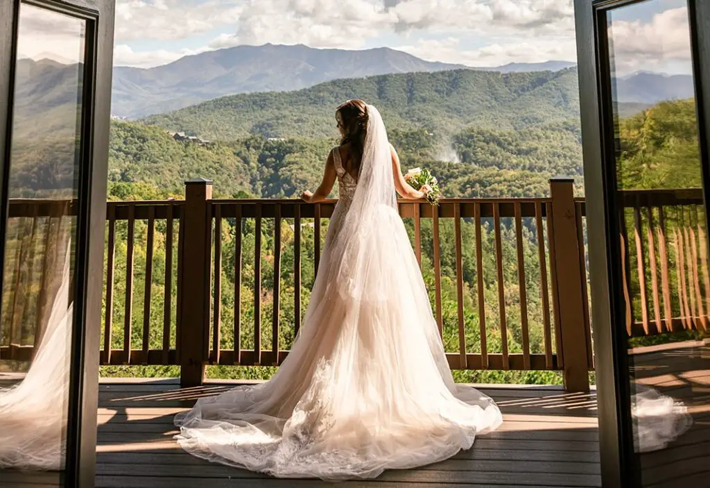 bride standing in front of green mountains