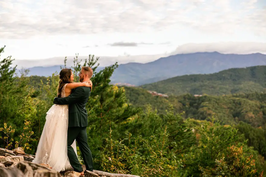 bride and groom on a mountaintop